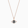 A 14K rose gold chain necklace with a blue, white, and black diamond evil eye pendant (0.34 TCW).