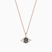 A 14K rose gold chain necklace with a blue, white, and black diamond evil eye pendant (0.34 TCW).