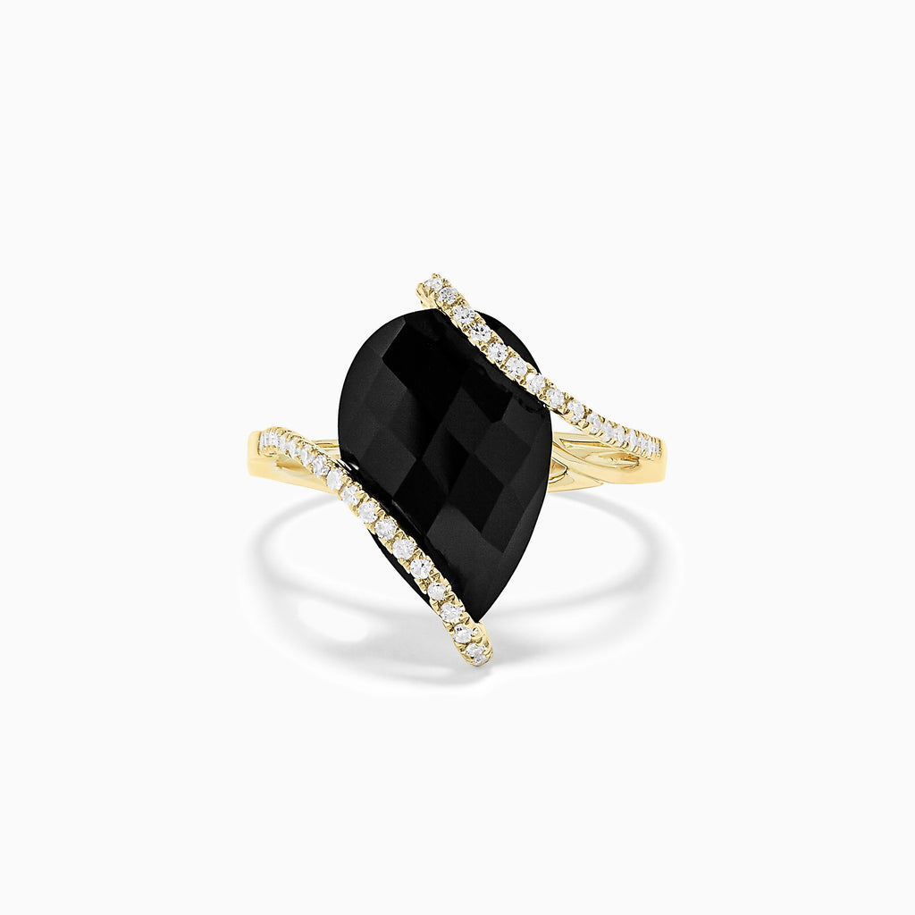 The Eclipse 14K Yellow Gold Onyx and Diamond Teardrop Ring, 6.49 TCW, features a teardrop-shaped black onyx accented by two rows of diamonds, set in yellow gold and displayed on a plain white background.
