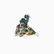 The Safari 14K White Gold Mix Diamonds and Ruby Peacock Ring (1.50 TCW) features a vibrant peacock design with sparkling diamonds and rubies, displayed against a plain white background.