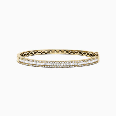 The DOro 14K Yellow Gold Diamond Bangle features two rows of sparkling white diamonds and a geometric cutout inner design—a sophisticated choice for any occasion.