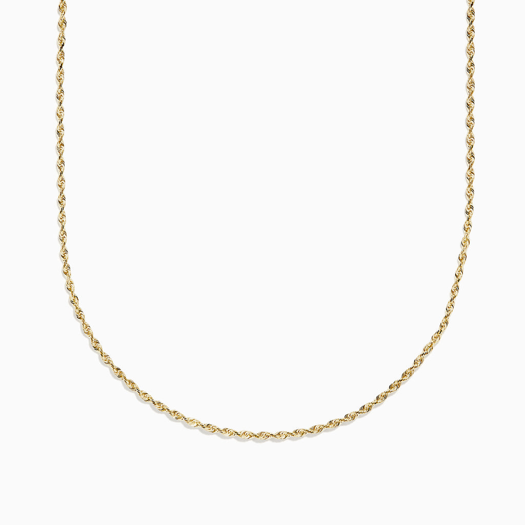 The 14K Yellow Gold Woven Rope Chain 22 is elegantly displayed against a white background, its delicate yellow gold links forming a gentle curve.