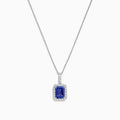 The Nahla Siri 14K White Gold Tanzanite and Diamond Pendant, 1.56 TCW, features a rectangular tanzanite surrounded by sparkling diamonds, elegantly displayed against a white background.