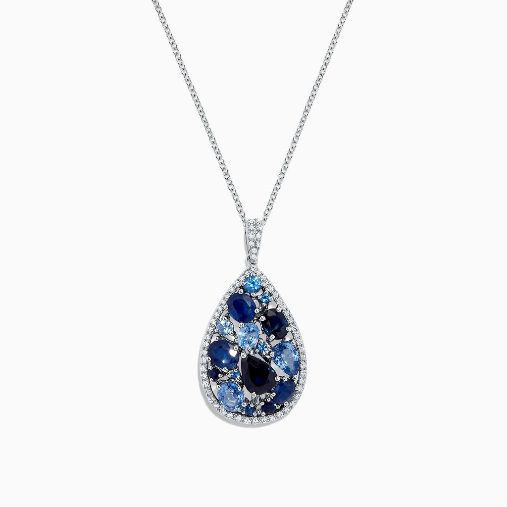 The 14K White Gold Sapphire and Diamond Drop Pendant, 3.80 TCW, features a teardrop design with clusters of dark and light sapphires, accented by diamonds on a silver chain, shown on a white background and inspired by Effy’s signature elegance.