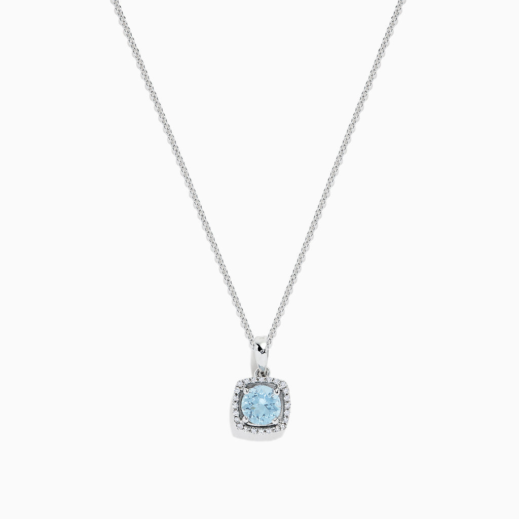 The Aquarius 14K White Gold Aquamarine and Diamond Pendant features a square light blue aquamarine surrounded by sparkling diamonds, all on a delicate chain. Total carat weight: 0.78 TCW.