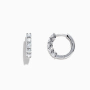 A pair of Pave Classica 14K White Gold 5/8 Diamond Hoop Earrings, 0.98 TCW, shown on a plain white background.