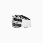 The 14K White Gold Black and White Diamond Ring, 2.48 TCW, features alternating rows of rectangular black and white diamonds in a sleek band, elegantly displayed against a white background.