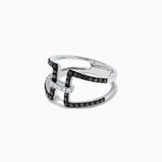 A striking 14K White Gold Black and White Diamond Ring, 0.49 TCW, showcases an open geometric design with two parallel black diamond bands connected by a central row of sparkling white diamonds.