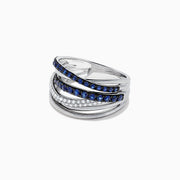 The Royale Bleu 14K White Gold Blue Sapphire & Diamond Ring (0.91 TCW) features intertwined bands, one set with blue sapphires and another with sparkling diamonds, all displayed against a white background.