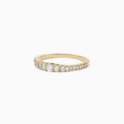 The Pave Classica 14K Yellow Gold Diamond Band Ring, 0.31 TCW, features a sparkling row of diamonds set in yellow gold, elegantly displayed on a plain white background.