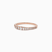 The Pave Classica 14K Rose Gold Diamond Band Ring, 0.31 TCW, features a row of sparkling diamonds along the rose gold band for an elegant touch.