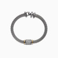 The 925 Sterling Silver & 18K Yellow Gold Diamond Bracelet, 0.53 TCW, features a mesh chain with a diamond-encrusted cylindrical centerpiece accented by yellow gold bands, displayed on a white background.