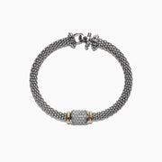 The 925 Sterling Silver & 18K Yellow Gold Diamond Bracelet, 0.53 TCW, features a mesh chain with a diamond-encrusted cylindrical centerpiece accented by yellow gold bands, displayed on a white background.