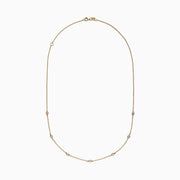 The DOro 14K Yellow Gold 18 Diamond Station Necklace (0.21 TCW) features five round bezel-set diamonds spaced along the front and is shown on a white background.