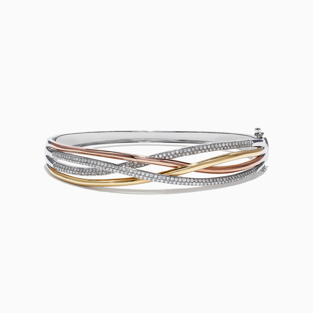The Trio 14K Tri-Color Gold Diamond Crossover Bangle, 1.03 TCW, features intertwined bands of yellow, rose, and white gold accented with sparkling diamonds for an elegant and striking effect.