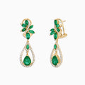 The Brasilica 14K Yellow Gold Emerald and Diamond Earrings, 4.62 TCW, showcase green gemstones in a floral design with teardrop emeralds and white diamond accents outlining the lower drop shape.
