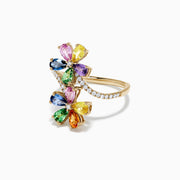 The Watercolors 14K Gold Multi Sapphire and Diamond Floral Ring, 3.03 TCW, features two flower shapes with multicolored sapphire petals and a diamond-adorned band, shown on a white background.