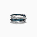 The Bella Bleu 14K White Gold Blue and White Diamond Ring, 0.56 TCW, features intertwined bands set with sparkling blue and white diamonds, beautifully displayed against a white background.