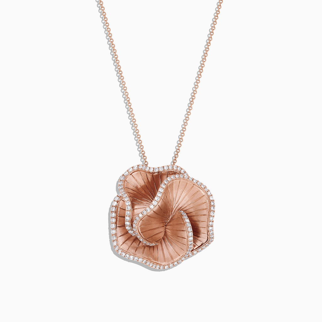The Pave Rose 14K Rose Gold Diamond Flower Pendant, 0.85 TCW, features layered petals with sparkling pave diamond accents and hangs from a fine rose gold chain on a white background.