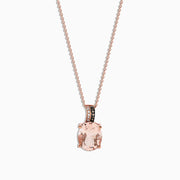 A 14K rose gold necklace featuring a 3.13 morganite pendant accented with a row of sparkling diamonds on the bail, shown on a fine chain against a white background.