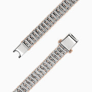 The Mens Sterling Silver and Rose Gold Black Sapphire Bracelet, 4.20 TCW, features a rectangular centerpiece with rows of black sapphires on silver and rose gold links, displayed against a white background.