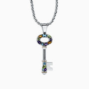 The 925 Sterling Silver & 18K Gold Multi Gemstone Key Pendant (2.29 TCW) features colorful gemstones around the key top and bottom, hanging from a twisted chain.