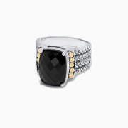 The 925 Sterling Silver & 18K Yellow Gold Onyx Ring, 6.00 TCW, showcases a large faceted black onyx accented by yellow gold circles and a textured engraved band for an elegant statement look.