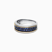 The Mens Sterling Silver & 18K Yellow Gold Blue Sapphire Ring, 1.45 TCW, features three rows of small round blue sapphires set in the center, bordered by thin yellow gold accents, shown against a white background.