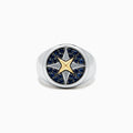 A mens sterling silver and 18K yellow gold ring features a gold star center, encircled by blue sapphires (0.75 TCW) in a striking pattern on top.