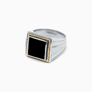 Mens Sterling Silver and 14K Yellow Gold Onyx Ring, 1.53 TCW features a large, square black onyx framed by gold twisted rope design and an angular geometric band, set against a white background.