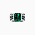 The Mens Sterling Silver and 14K Yellow Gold Malachite Ring, 6.05 TCW, features an intricate geometric pattern and a rectangular green malachite stone set in a yellow gold bezel, shown on a plain white background.