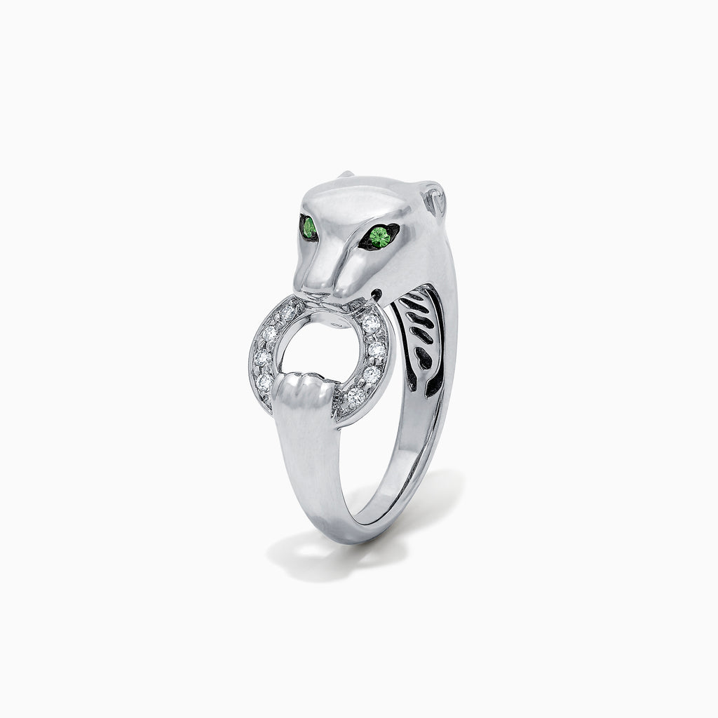 The Signature Sterling Silver Diamond and Tsavorite Panther Ring, 0.13 TCW, features green gemstone eyes and a diamond-studded ring in its mouth. Displayed on a plain white background.