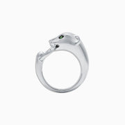 The Signature Sterling Silver Diamond and Tsavorite Panther Ring, 0.13 TCW, features green gemstone eyes and a diamond-studded ring in its mouth. Displayed on a plain white background.