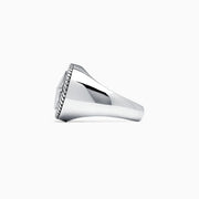The Mens Sterling Silver Compass Ring showcases a detailed star at the center and engraved directional markers (N, E, S, W) around the edge. Its striking design is highlighted against a plain white background.