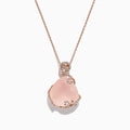 A 14K rose gold necklace features a large, teardrop-shaped rose quartz pendant (16.18 TCW) accented with diamonds, elegantly displayed against a white background.