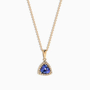 The Nahla Siri 14K Yellow Gold Tanzanite & Diamond Pendant (0.72 TCW) features a triangular tanzanite gemstone framed by diamonds, shown on a white background.