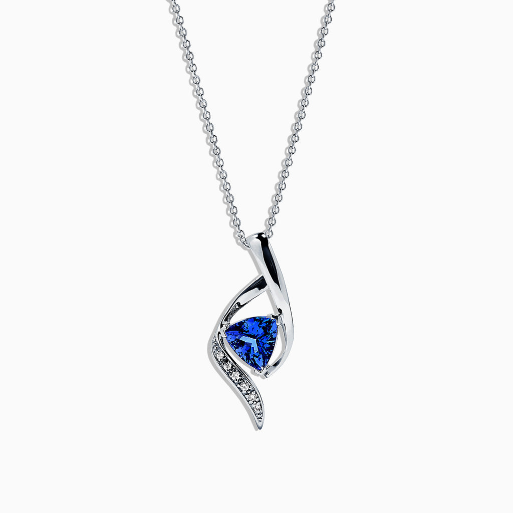 The Nahla Siri 14K White Gold Tanzanite & Diamond Pendant (1.46 TCW) features a twisted design with a triangular tanzanite gemstone and a row of sparkling diamonds set along one curve.