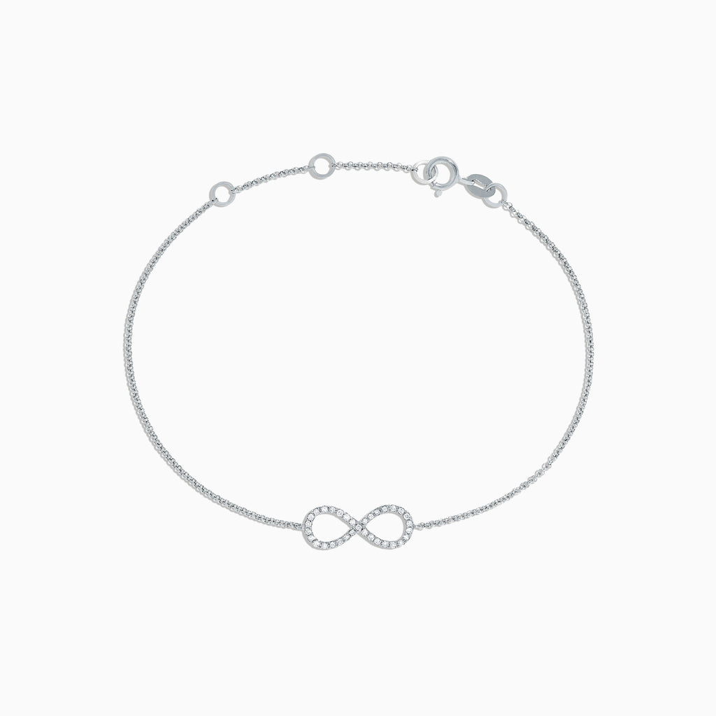 The Novelty 14K White Gold Diamond Infinity Bracelet, 0.12 TCW, features a sparkling infinity symbol on a delicate chain with clasp closure and three adjustable loops for an ideal fit.