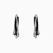 A pair of elegant Effy 14K White Gold Black and White Diamond Earrings (0.79 TCW) featuring intertwined bands, displayed on a white background.