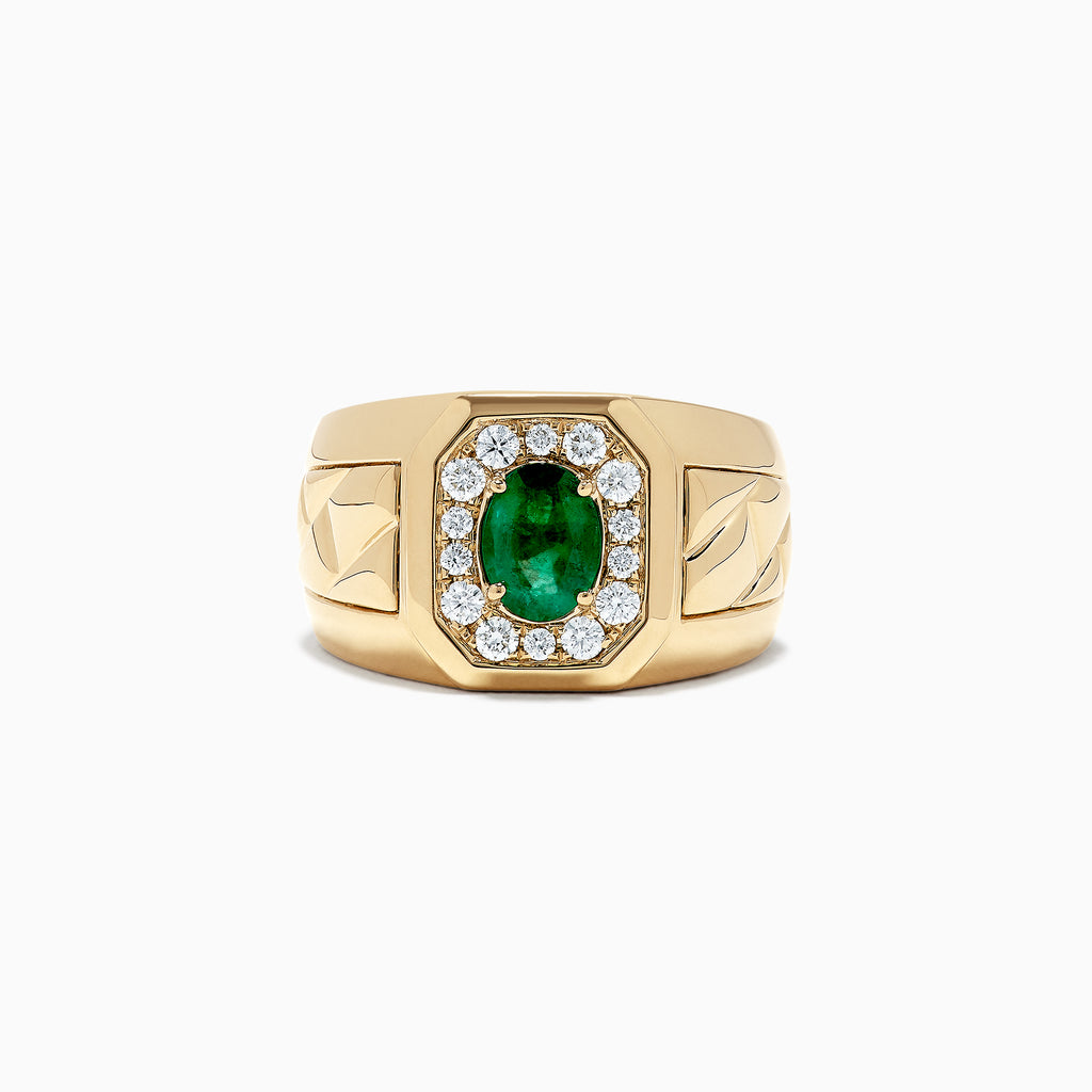 The Mens 14K Yellow Gold Emerald and Diamond Ring, 1.55 TCW, features an oval green emerald with a diamond halo, set on a wide band engraved with geometric patterns.