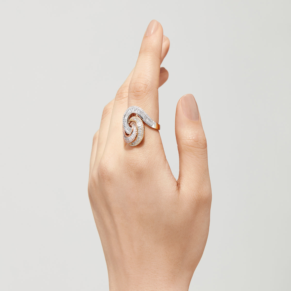 The Trio 14K Tri Color Gold Diamond Swirl Statement Ring, 1.66 TCW, features a spiral design with clear, pink, and yellow diamonds set in white, yellow, and rose gold for a luxurious look.