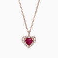 The Ruby Royale 14K Rose Gold Heart Shaped Ruby Pendant (1.28 TCW) features a romantic ruby centerpiece, accented by sparkling diamonds on a delicate rose gold chain for an elegant touch.