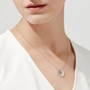 The Classique 14K White Gold Diamond Swirl Pendant (0.48 TCW) features a round swirl design with sparkling diamonds, inspired by Effy Classique and set on a delicate white gold chain for an elegant, modern style.