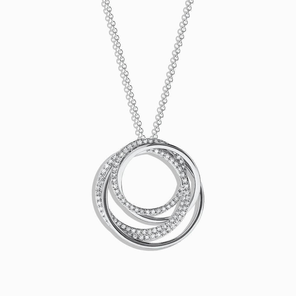 The Pave Classica 14K White Gold Diamond Pendant (0.41 TCW) features intertwined circles adorned with sparkling diamonds, elegantly suspended from a delicate chain against a white background.