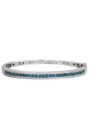 The Bella Bleu 14K White Gold Bangle features a sleek row of blue and white diamonds totaling 2.13 TCW, crafted in brilliant 14K white gold.
