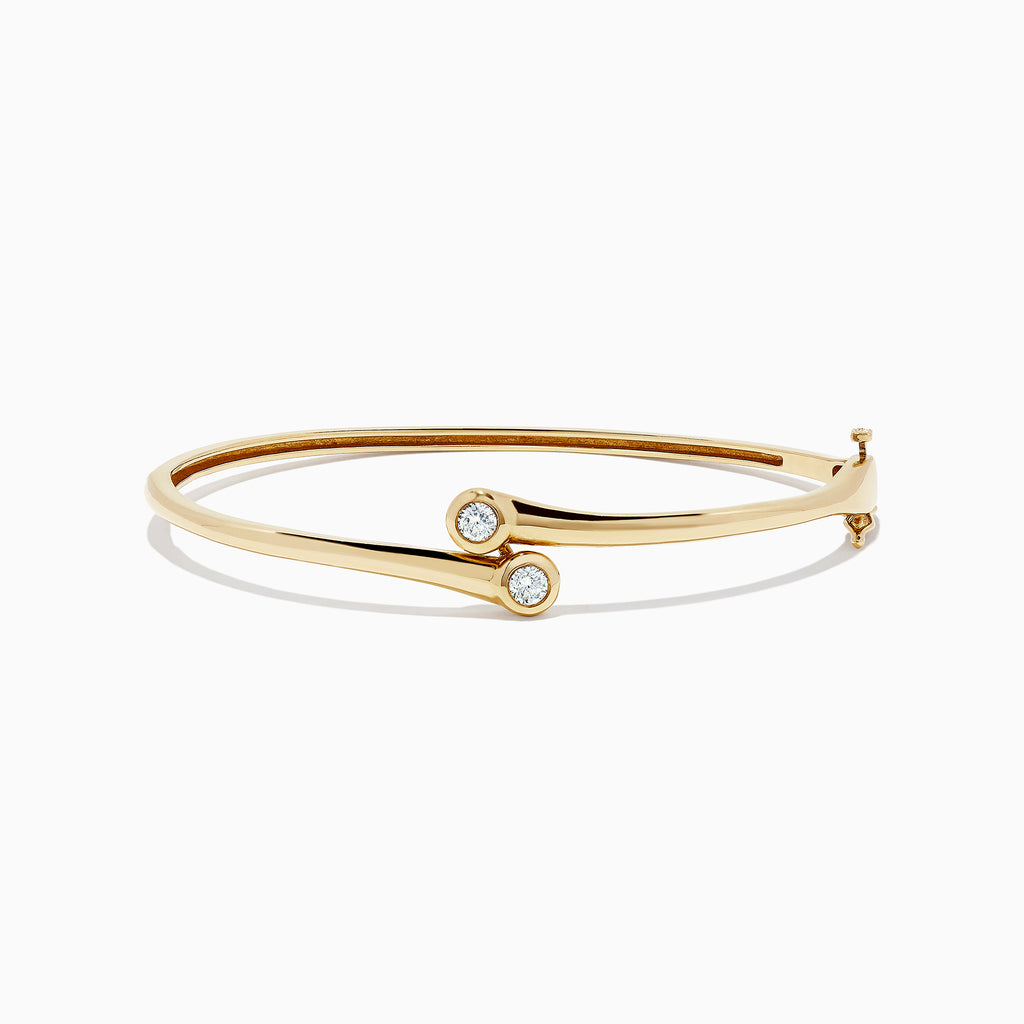 The DOro 14K Yellow Gold Diamond Two-Of-Us Bangle, 0.39 TCW, features two round diamond accents on the ends of overlapping bands, displayed against a white background.