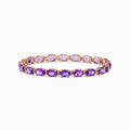 A stunning 14K rose gold amethyst and diamond bracelet featuring a continuous row of oval-cut purple gemstones set in individual prongs around the band—a signature Effy design.