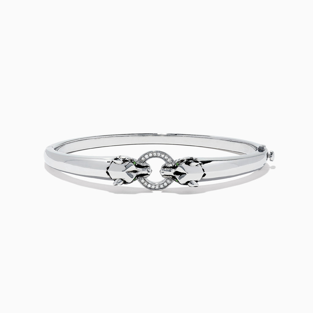 The Signature Sterling Silver Diamond and Tsavorite Panther Bangle, 0.10 TCW, features a sleek design with a central panther motif set with diamonds and tsavorites for a luxurious touch.