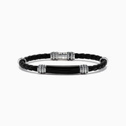 The Mens Sterling Silver and Leather Onyx Bracelet, 13.00, features black braided leather with silver-toned clasps and accents, shown on a white background.