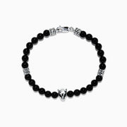 The Mens Sterling Silver Beaded Onyx Bracelet, 41.80 TCW, features black round beads, sterling silver accents, and a silver wolf head charm—an ideal accessory for Effy mens bracelet fans.
